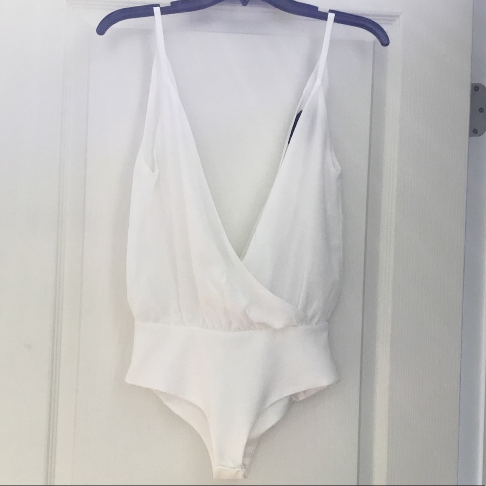 Rise of Dawn white tank top bodysuit. NWOT. XS